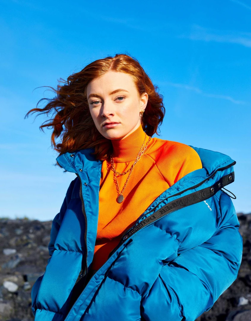 Froukje outside in blue coat